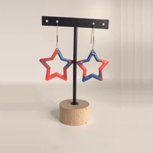 Boucles d&rsquo;oreilles peinture à effet et résine, étoile orange fluo et bleu nuit